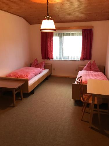 Postel nebo postele na pokoji v ubytování Stubalm Appartements