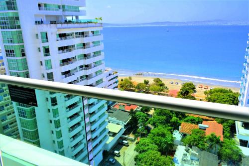 a large building with a view of the ocean at Travelers Orange Cartagena in Cartagena de Indias