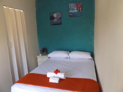 Cama o camas de una habitación en Buganvilla Guest House