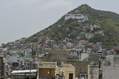 a view of a city with a hill at Hotel Royal Ajmer in Ajmer