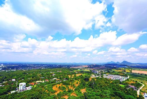 an overhead view of a city with trees and buildings at LuxSL LuxuryStyleofLife 4 in Pattaya Central