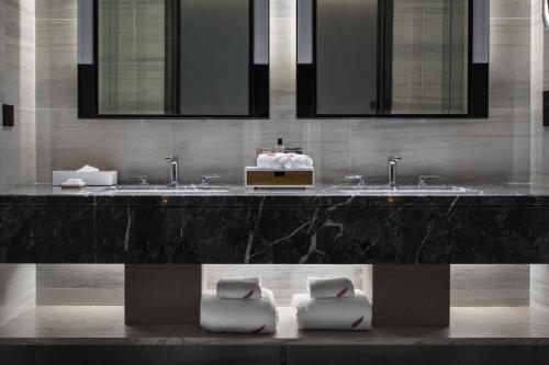 Koupelna v ubytování Swisstouches Guangzhou Hotel Residences