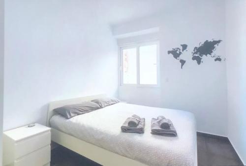 Posteľ alebo postele v izbe v ubytovaní lovely apartament Alicante