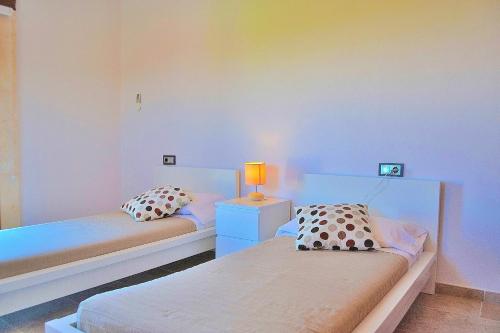 Lova arba lovos apgyvendinimo įstaigoje Villa Rey del Campo 140 by Mallorca Charme