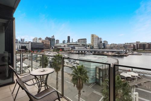 a view from a balcony overlooking a city at Docklands Private Collection - NEWQUAY in Melbourne