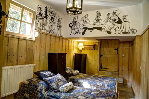 Posteľ alebo postele v izbe v ubytovaní Apartament Regionalny