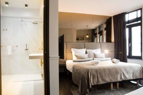 Cama o camas de una habitación en House of Amstel