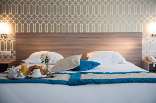 Postel nebo postele na pokoji v ubytování Hotel & Spa Radiana