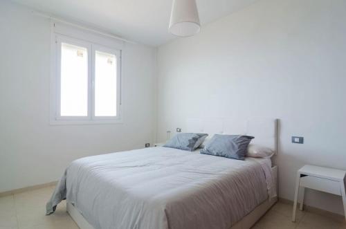 Ένα ή περισσότερα κρεβάτια σε δωμάτιο στο Ático Vistas Mar y Teide 518