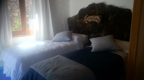 Postel nebo postele na pokoji v ubytování Villa Juan