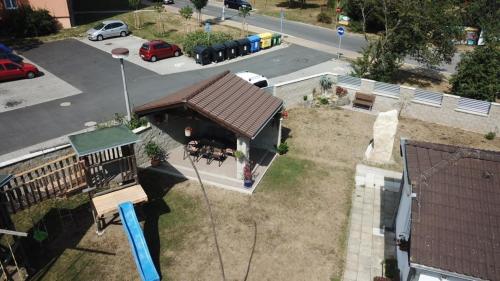an aerial view of a building with a brown roof at Penzion Olga in Mariánské Lázně