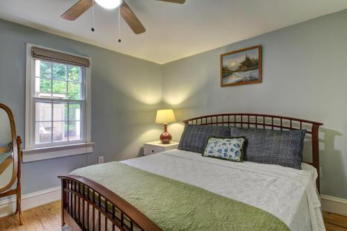 a bedroom with a bed and a ceiling fan at Laurel Lodge at Mountain Cove in Fort Smith