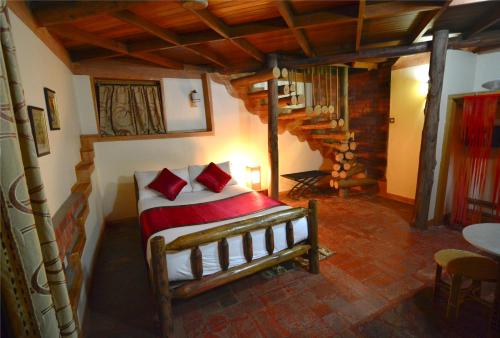 Voodi või voodid majutusasutuse Forest Cottages toas