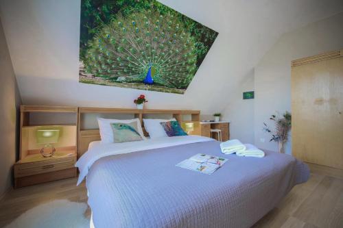 A bed or beds in a room at Villa Aviator