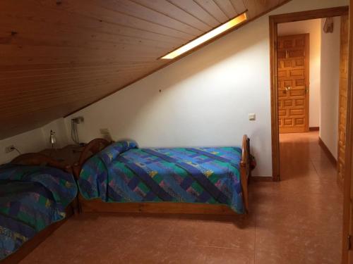 Ένα ή περισσότερα κρεβάτια σε δωμάτιο στο Casa Marsial