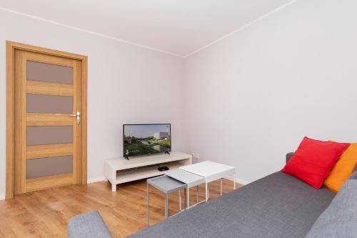 Apartment Poznań by Rentersにあるベッド