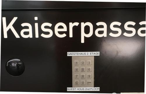 a sign that reads klezmerras on a wall at Hostel Gästehaus Kaiserpassage- Ihr Cityhostel in Karlsruhe