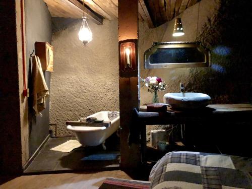 a bathroom with a sink and a toilet and a sink at The Cave Of Wine by Casavino in Casablanca