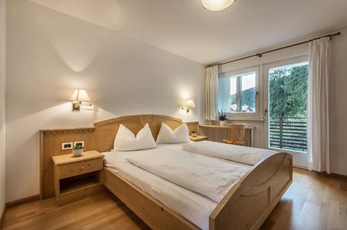 Postel nebo postele na pokoji v ubytování Medesc