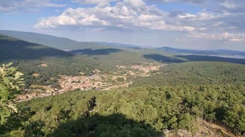 an aerial view of a town in the mountains at El Mirador de Molinos in Molinos de Duero