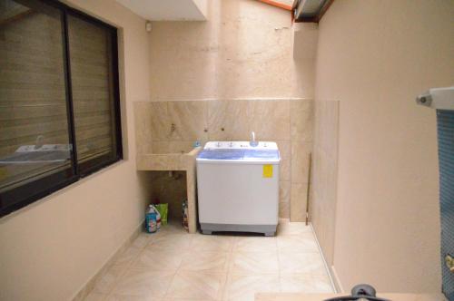 Een badkamer bij VFC Suites Cuenca - Ecuador