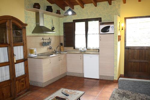 Kuchyň nebo kuchyňský kout v ubytování Apartamento El Carro - La Xiarapina
