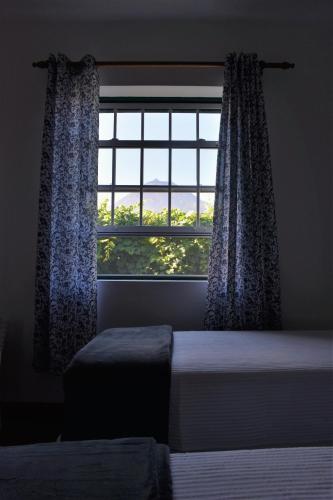 Ένα ή περισσότερα κρεβάτια σε δωμάτιο στο Casa das Ondas
