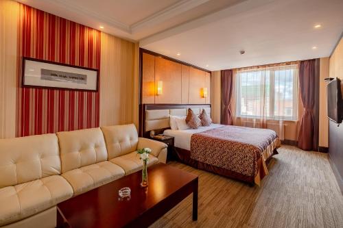 Letto o letti in una camera di Grand Hill Hotel Ulaanbaatar
