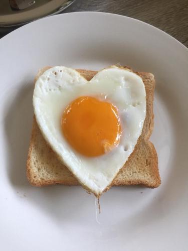 an egg in the shape of a heart on toast at Khaokhab Lodge in Nong Nam Daeng