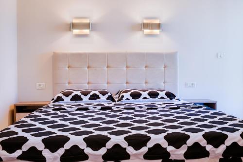 Ένα ή περισσότερα κρεβάτια σε δωμάτιο στο Pavel's Apartment