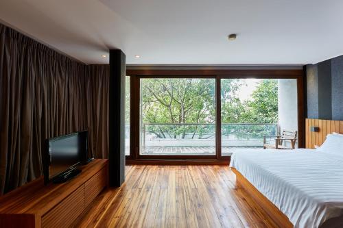 Katil atau katil-katil dalam bilik di LUXX Langsuan Hotel - SHA Plus