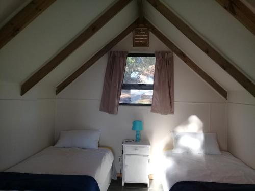 Cama o camas de una habitación en Sedgefield Huts