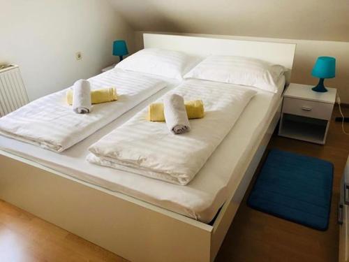 Posteľ alebo postele v izbe v ubytovaní Apartment Melody