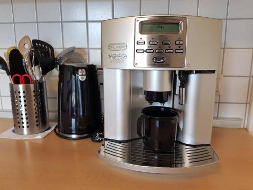 a coffee maker sitting on top of a counter at Ferienwohnung Sonnenfels **** in Bad Ems