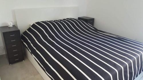 Кровать или кровати в номере Anatole - T3 - Moderne - Climatisé - 1er étage - Très grande terrasse - Vue magnifique et dégagée