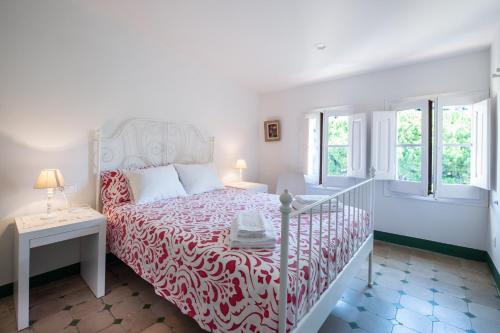 Ένα ή περισσότερα κρεβάτια σε δωμάτιο στο Apartament Can Mateu-Gran Terraza
