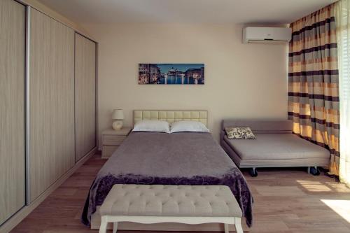Postel nebo postele na pokoji v ubytování Apartment At The Seaside
