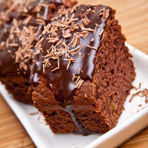a piece of chocolate cake with chocolate frosting at Clanree Hotel & Leisure Centre in Letterkenny