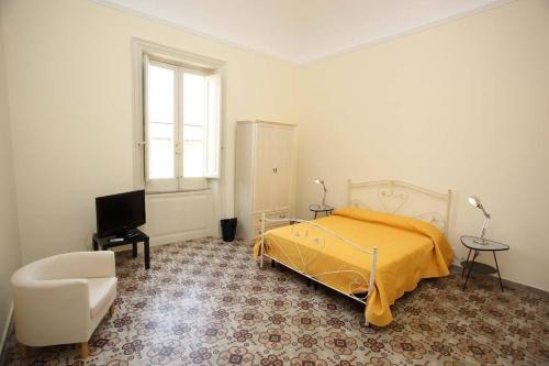 A bed or beds in a room at Alla Busiata