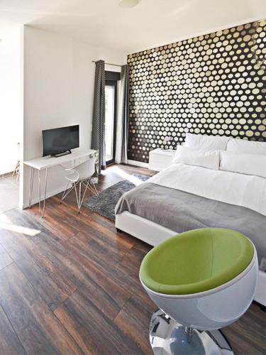 Μια τηλεόραση ή/και κέντρο ψυχαγωγίας στο Eco Smart Apartments Erlangen