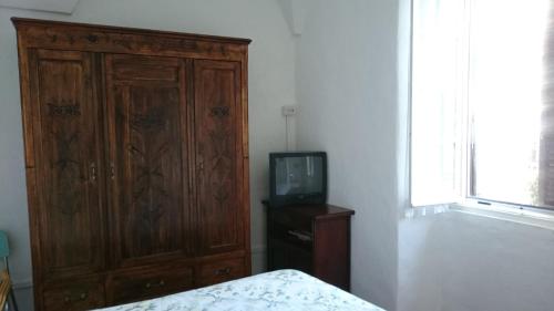 Ένα ή περισσότερα κρεβάτια σε δωμάτιο στο Risorgimento Apartment