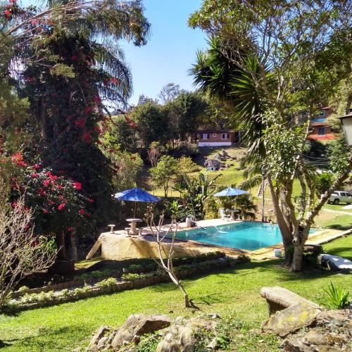 Kolam renang di atau dekat dengan Pousada Céu de Luz - Próximo a Monte Verde