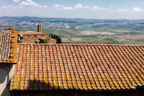 a view of a tile roof of a building at Scalette di Piazza B&B in Montalcino