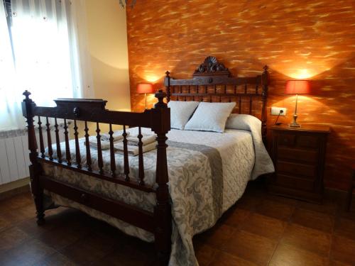 Кровать или кровати в номере Casas Rurales La Loma