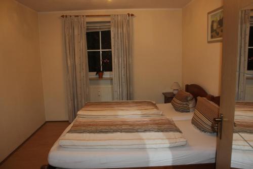 Postel nebo postele na pokoji v ubytování Ferienwohnungen Goldbach 1. Stock