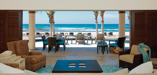 a living room with a view of the beach at Four Seasons Resort Punta Mita in Punta Mita