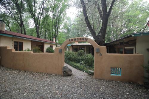 an entrance to a building with a sign that reads milwaukee at Dreamcatcher B&B in Taos
