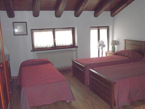 Postel nebo postele na pokoji v ubytování Hotel Ciocca