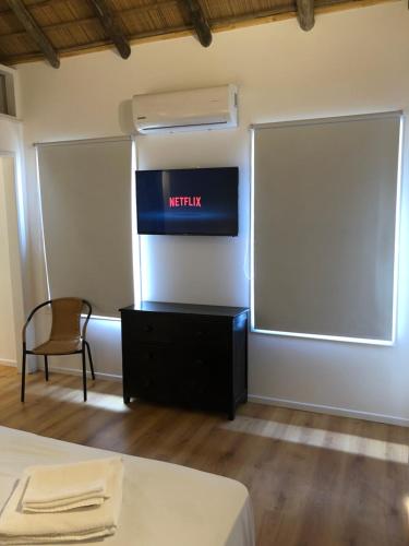 TV a/nebo společenská místnost v ubytování Los Quinchos