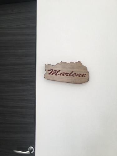 a door with a sign that says marquez on it at Casa Escape in Terrasini